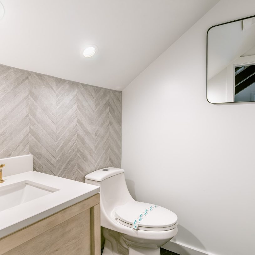 Modern bathroom with sleek fixtures in Lake Arrowhead Escape, offering comfort and style.