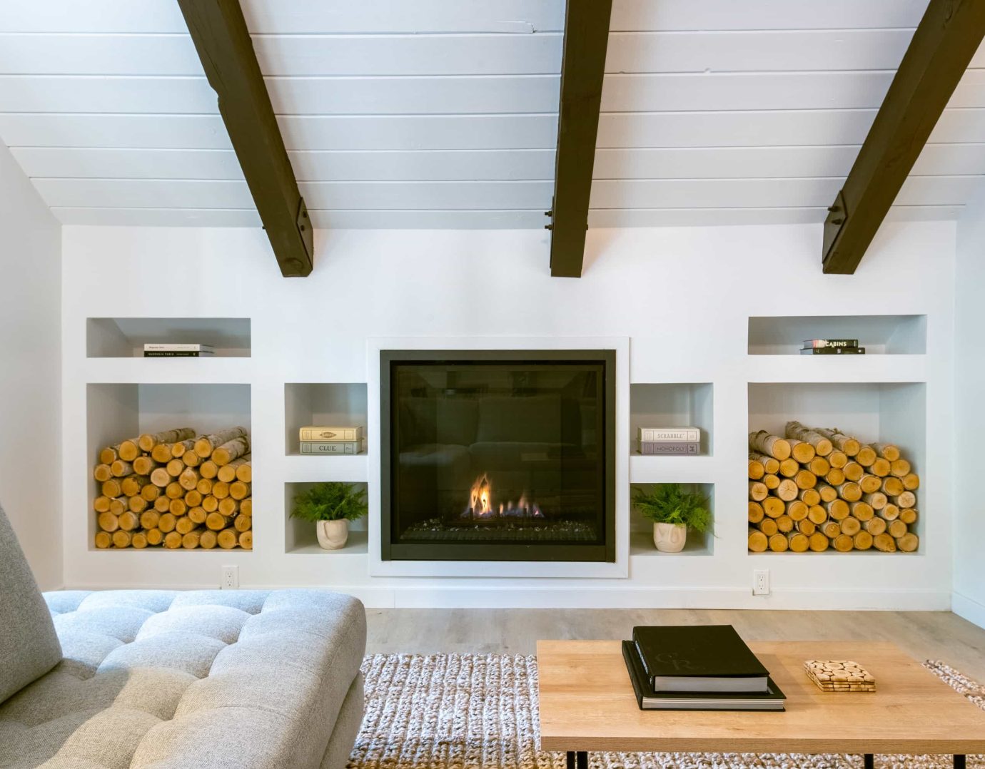 Cozy living room with fireplace, perfect for a Lake Arrowhead Family Vacation retreat.