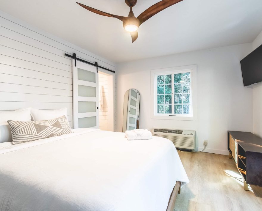 Cozy room in a Boutique Hotel near The Village, featuring serene decor and modern style.
