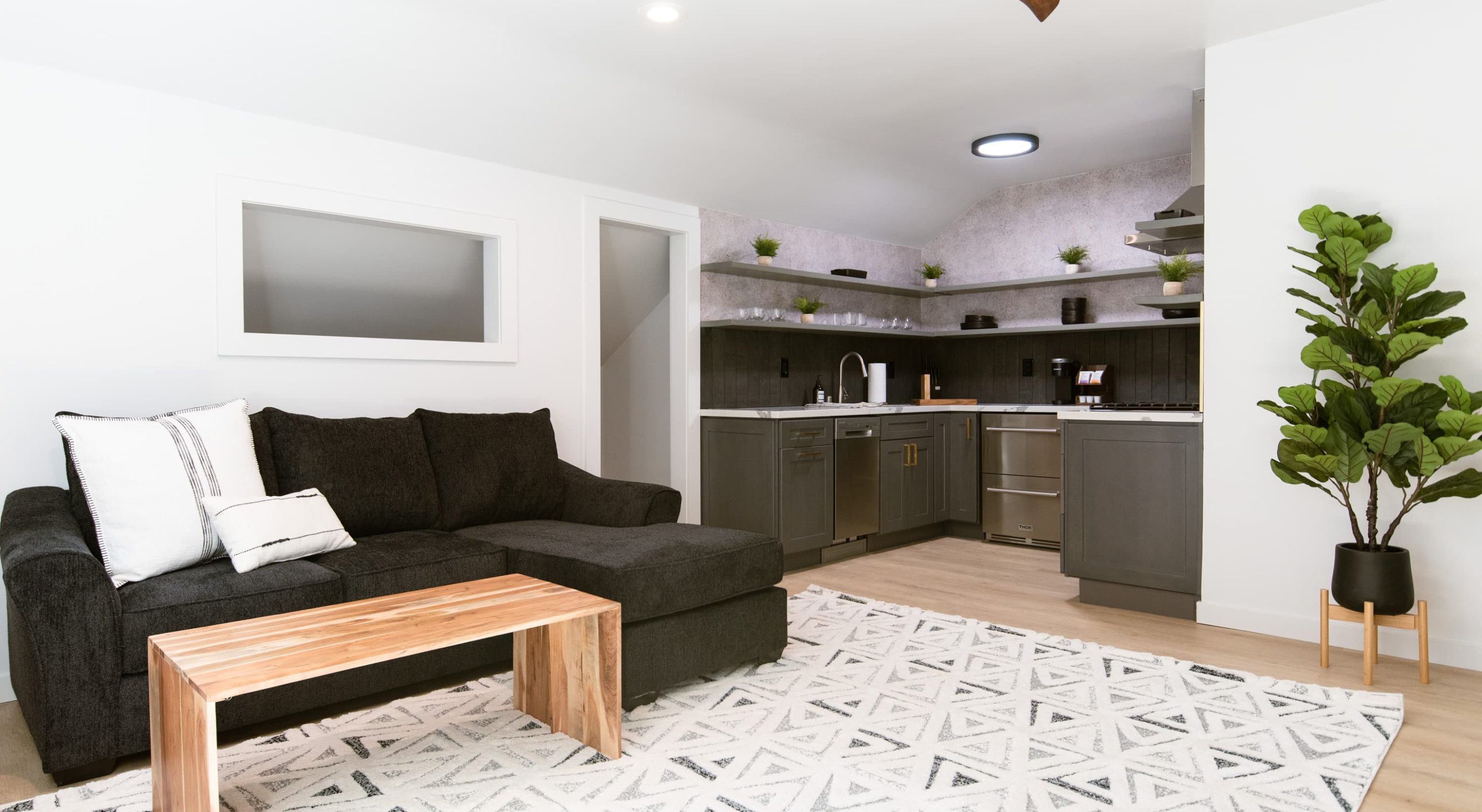 Modern, cozy living area at a boutique hotel near The Village, ideal for relaxation.