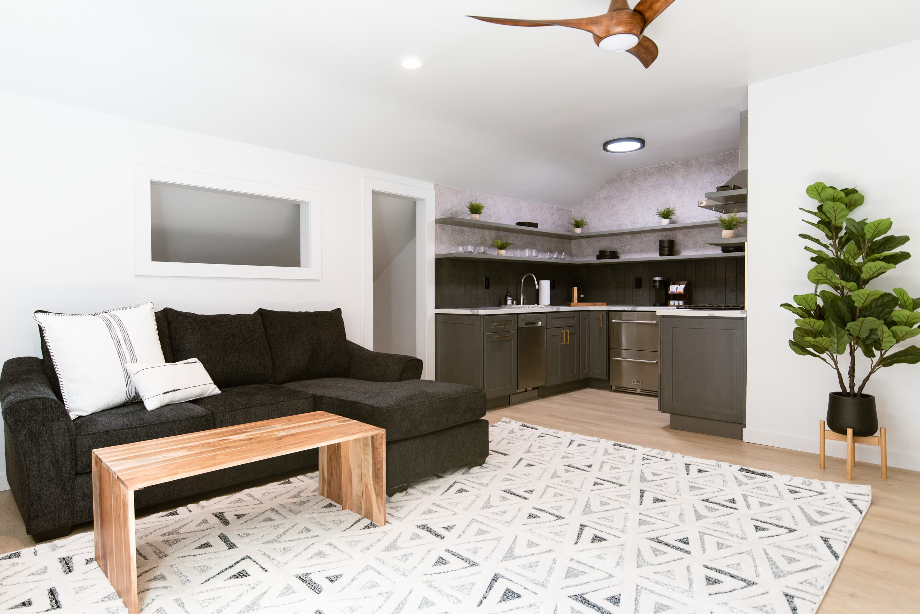 Modern, cozy living area at a boutique hotel near The Village, ideal for relaxation.