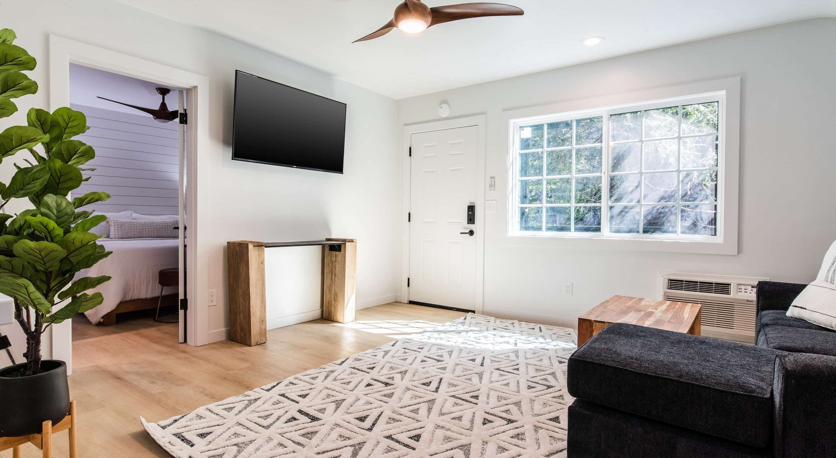 Modern living room in a Cozy Mountain Retreat; ideal for Lake Arrowhead family vacation.