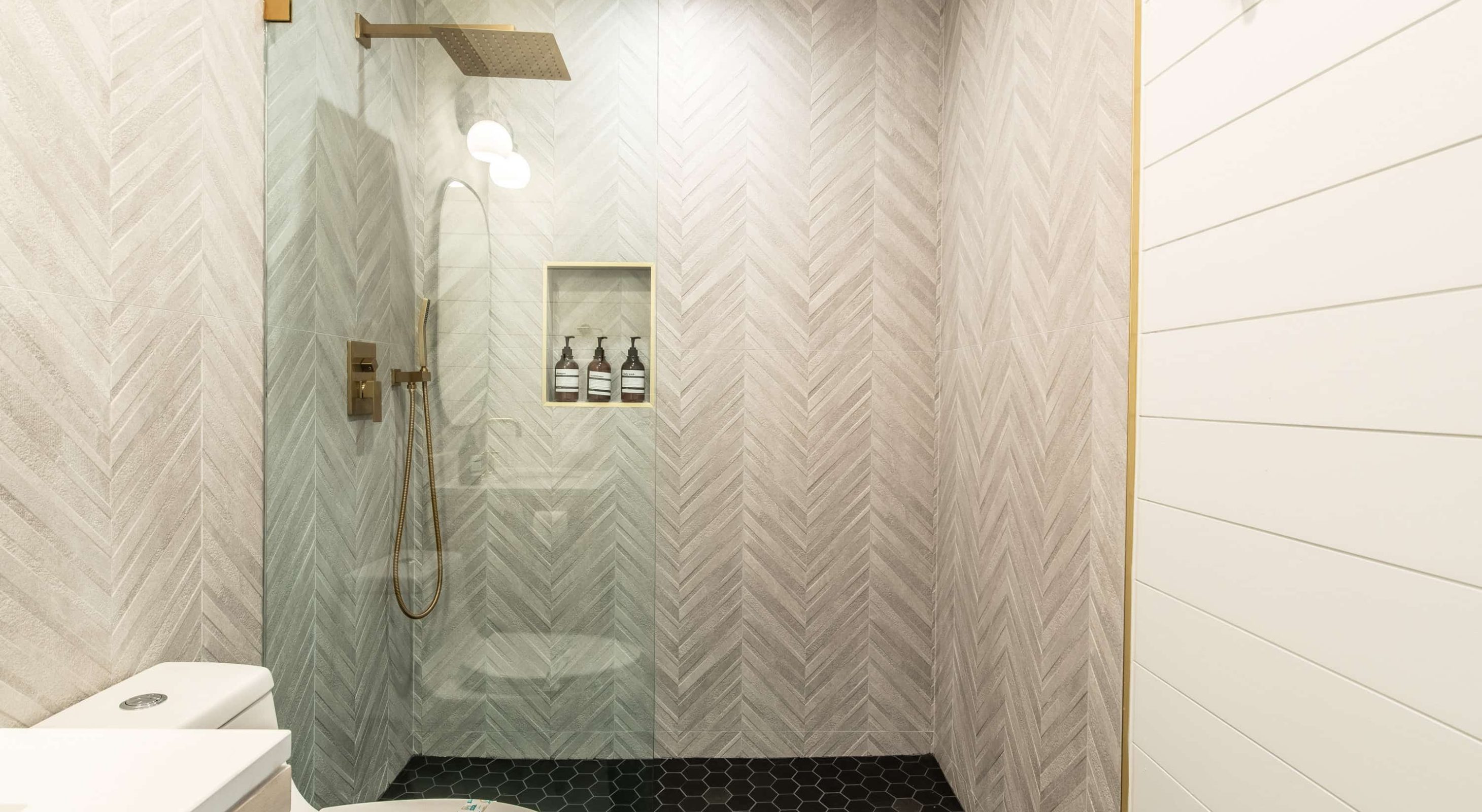 Modern bathroom design in a Boutique Hotel near the Village, featuring elegant fixtures.
