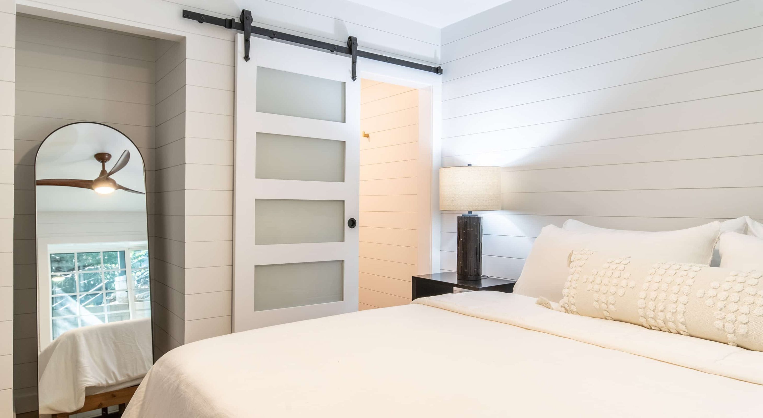 Cozy room with modern decor in a Boutique Hotel Near The Village, featuring elegant details.