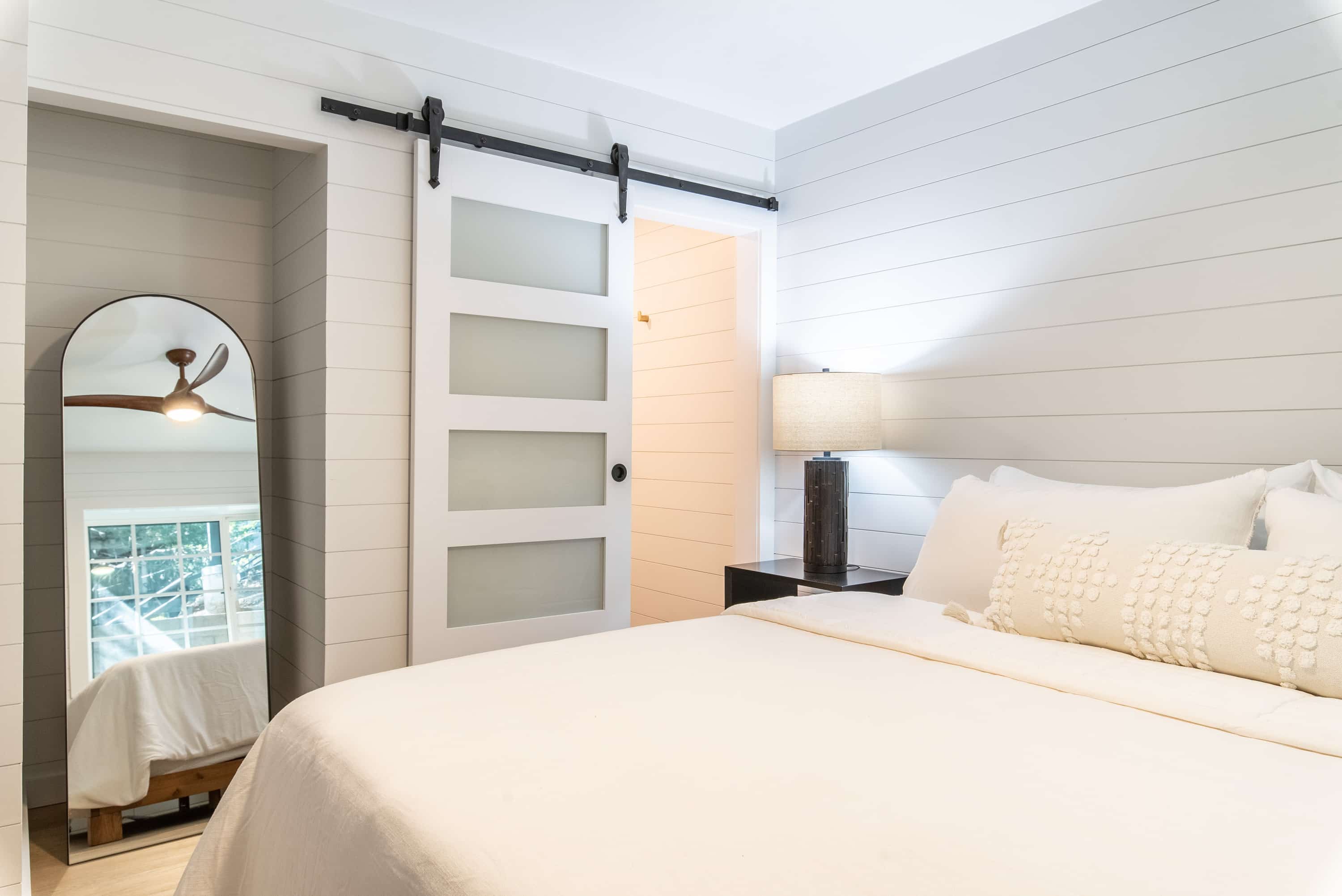 Cozy room with modern decor in a Boutique Hotel Near The Village, featuring elegant details.