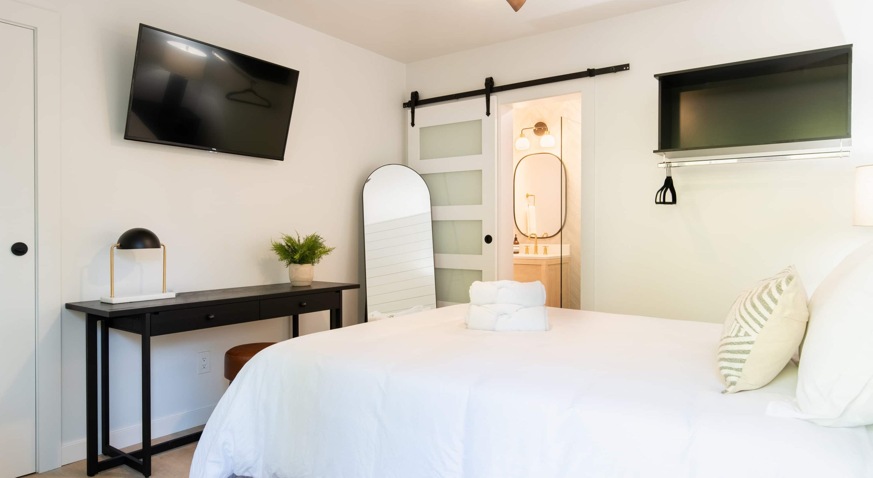 Modern, cozy room at a top place to stay in Lake Arrowhead, featuring elegant decor.