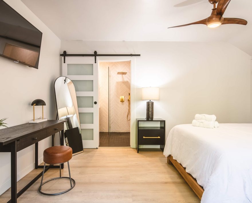 Cozy room at a boutique hotel near the village offers modern comforts and style.