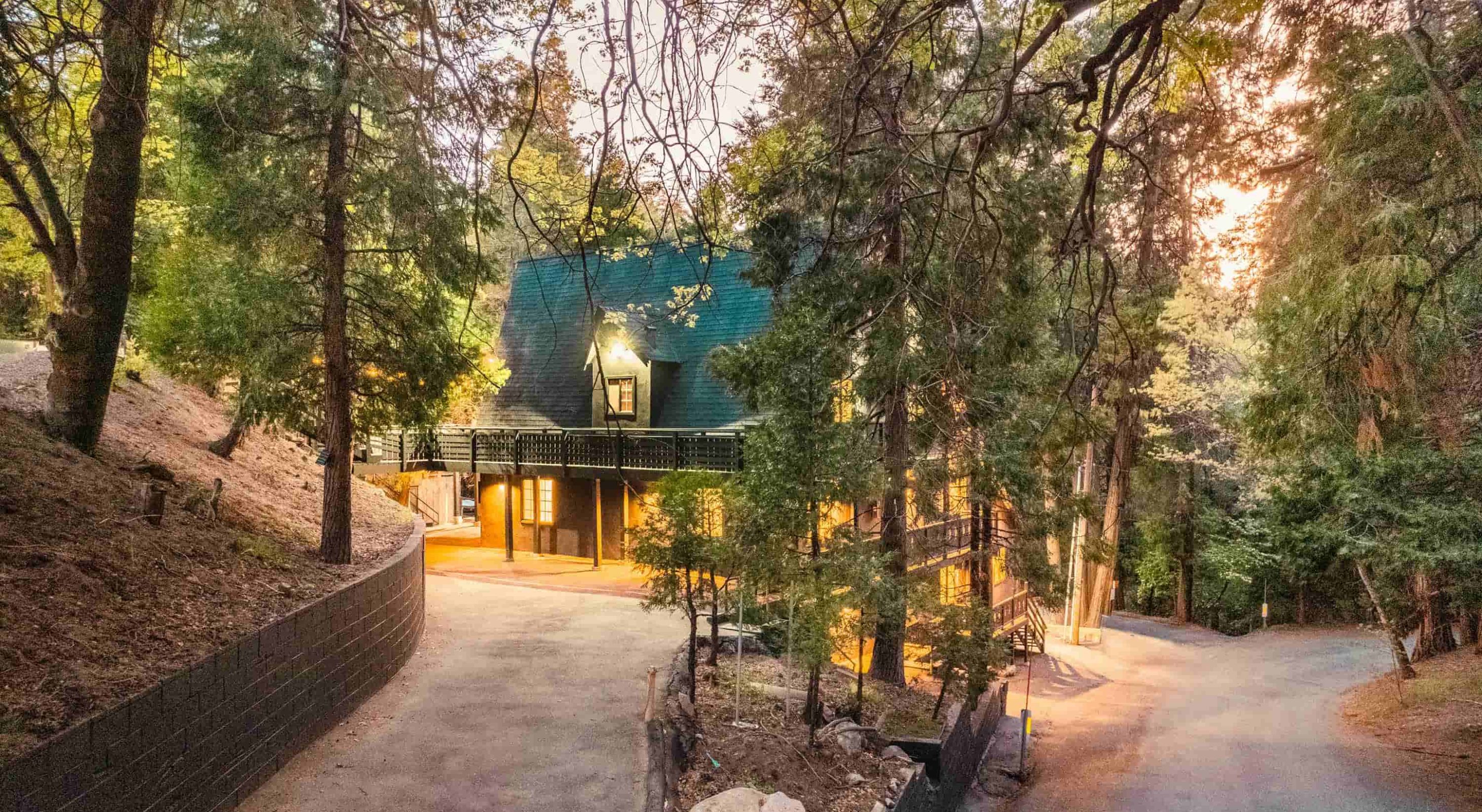 Cozy mountain retreat nestled among trees, ideal for a Lake Arrowhead family vacation.